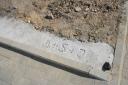 Eine Monogramm verewigt uns im Fundament der Mauer (A+S+J)